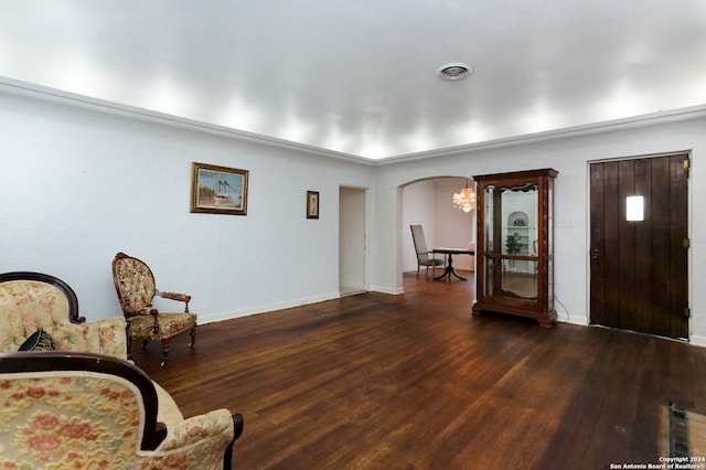 interior space featuring a notable chandelier and hardwood / wood-style flooring