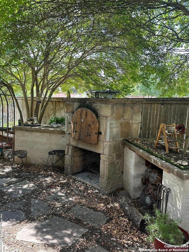 view of patio / terrace with fence