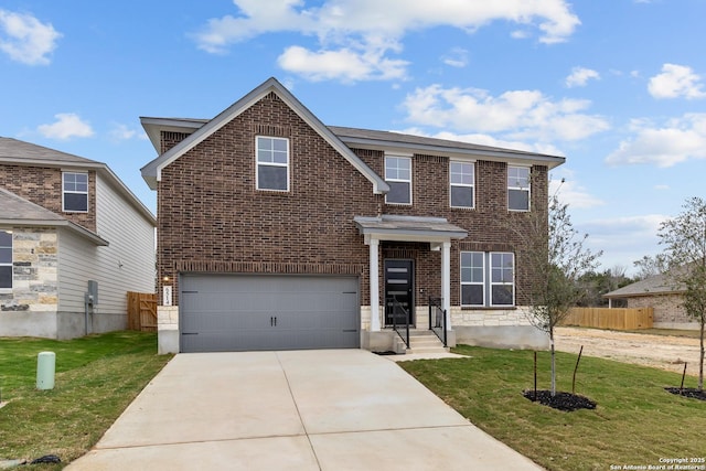 view of front facade featuring a garage and a front yard