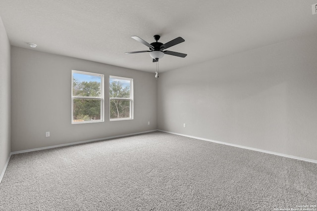 unfurnished room featuring a textured ceiling, ceiling fan, and carpet flooring