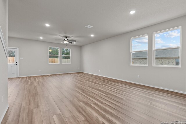 interior space featuring ceiling fan and hardwood / wood-style flooring