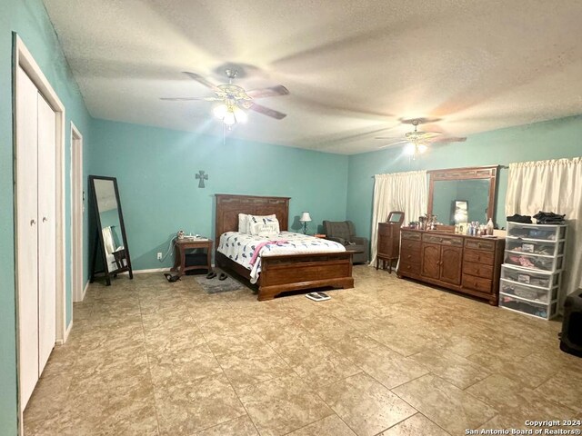 bathroom featuring vanity, tile walls, toilet, and tile patterned floors