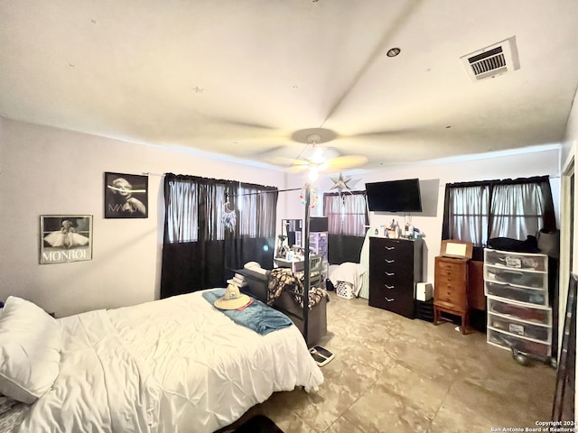 bedroom featuring ceiling fan