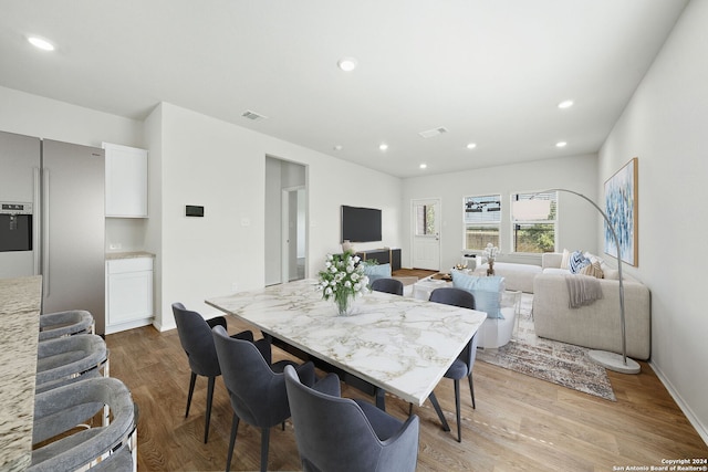 dining room featuring light wood-type flooring