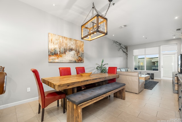 dining space with light tile patterned flooring