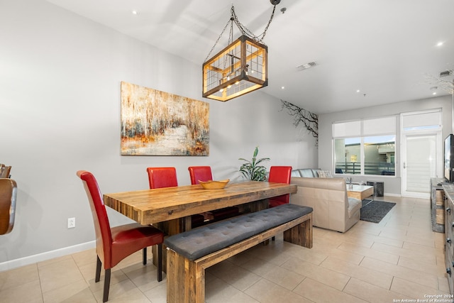 dining room with baseboards, visible vents, and recessed lighting