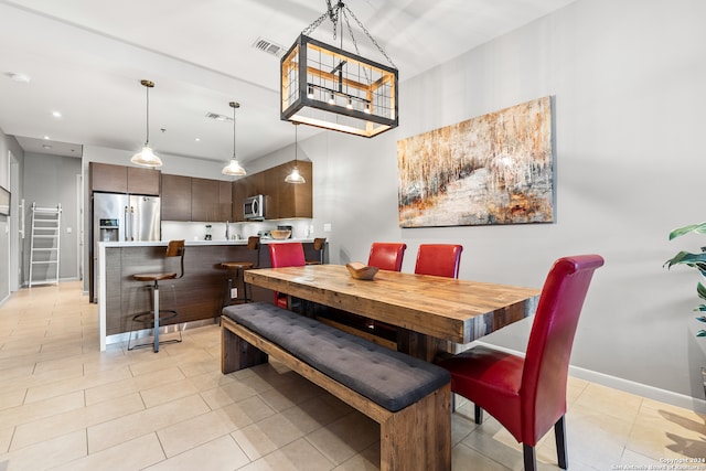 view of tiled dining space