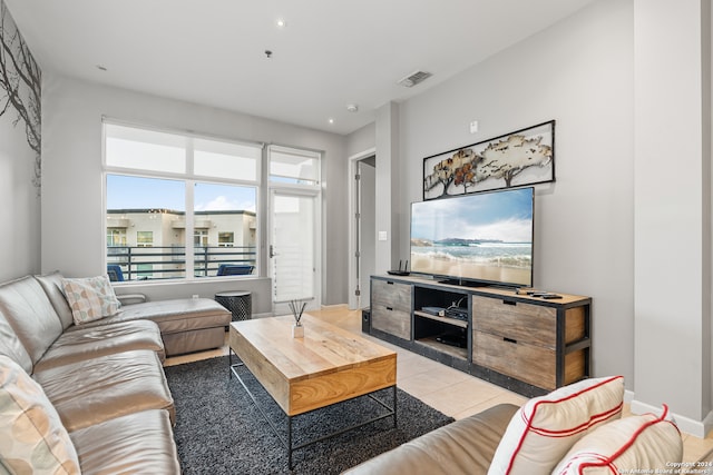 living room featuring light tile patterned floors