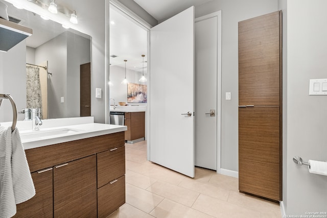 bathroom featuring tile patterned floors and vanity