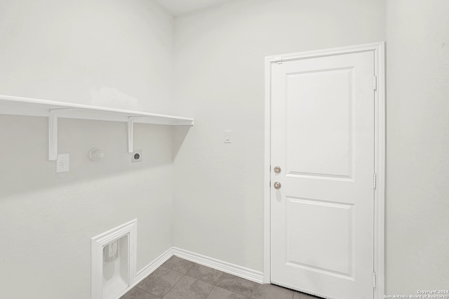 laundry room featuring hookup for an electric dryer, tile patterned flooring, and hookup for a gas dryer