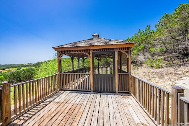 wooden terrace with a gazebo