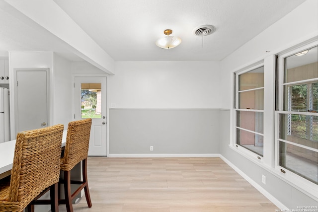 dining room featuring light wood-type flooring