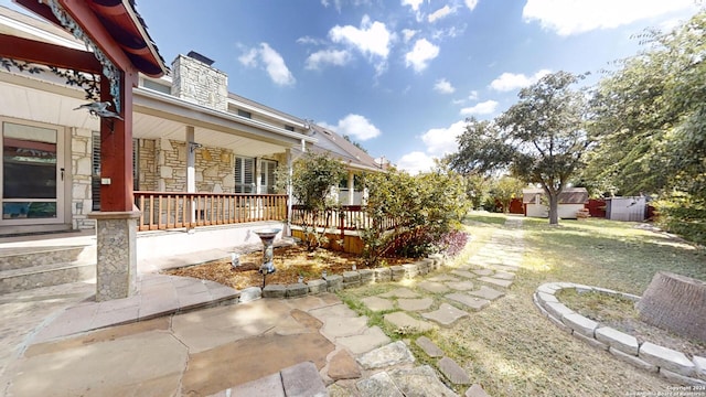 view of yard featuring a porch