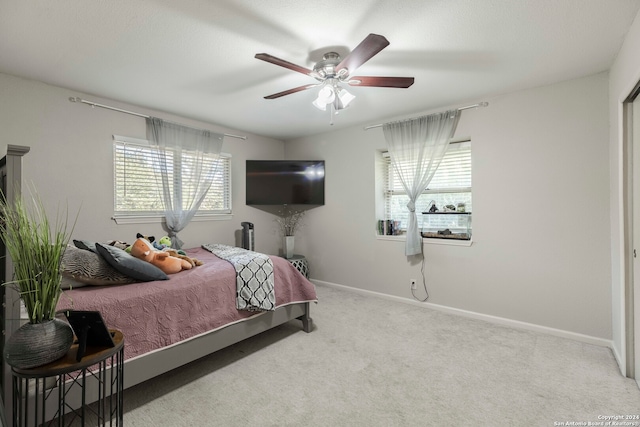 bedroom with carpet and ceiling fan