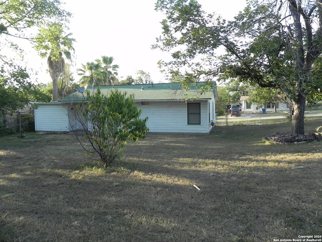 exterior space with a front lawn