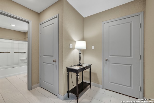 entryway featuring light tile patterned flooring