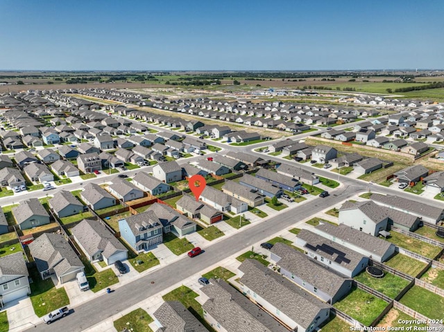 drone / aerial view with a residential view