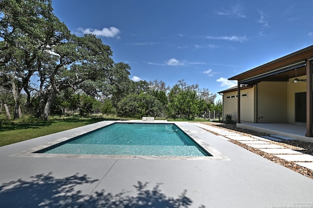 view of pool featuring ceiling fan and a patio