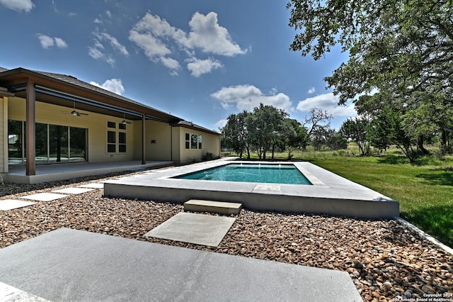 view of pool featuring ceiling fan and a patio