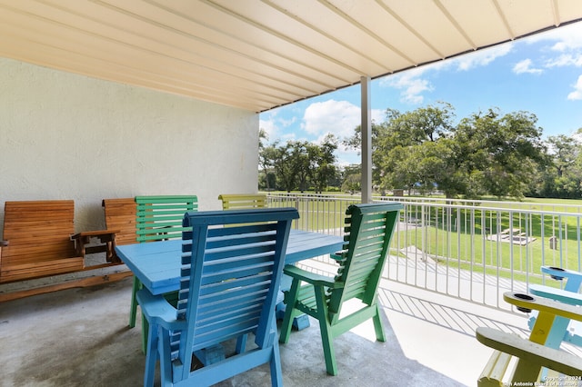 view of patio with a balcony