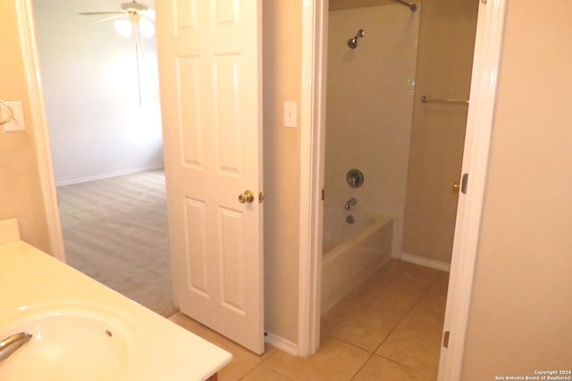 full bathroom with tile patterned flooring, shower / washtub combination, a ceiling fan, and vanity