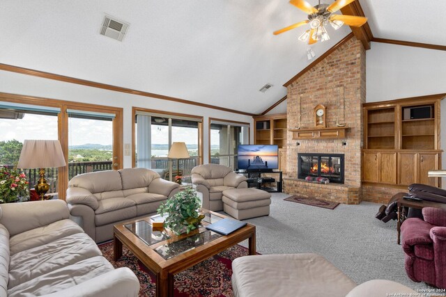 living room with a brick fireplace, high vaulted ceiling, ceiling fan, carpet floors, and brick wall