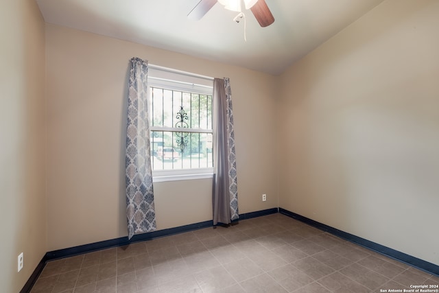 spare room featuring ceiling fan