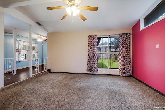 carpeted spare room with ceiling fan