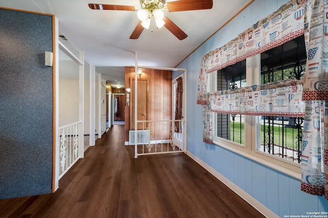 hallway with dark wood-type flooring