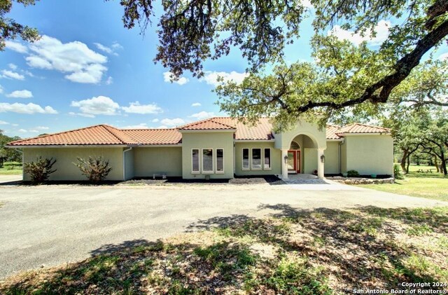 view of mediterranean / spanish-style house