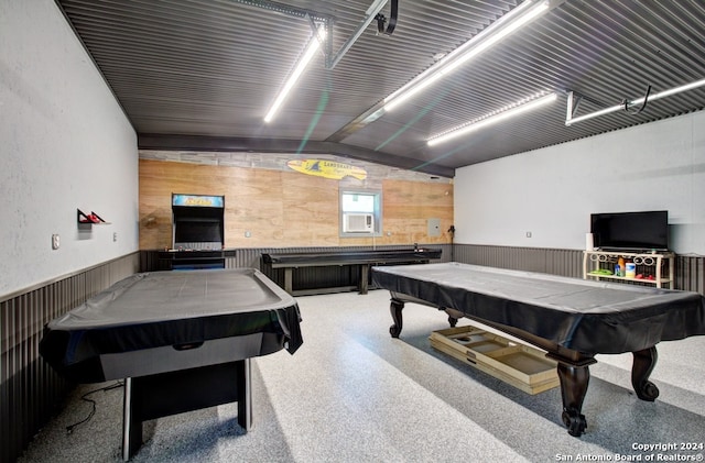 rec room featuring wood walls, pool table, and vaulted ceiling