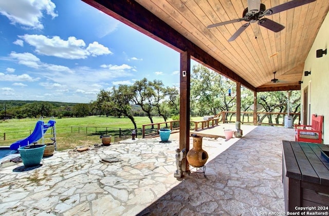 view of patio with ceiling fan