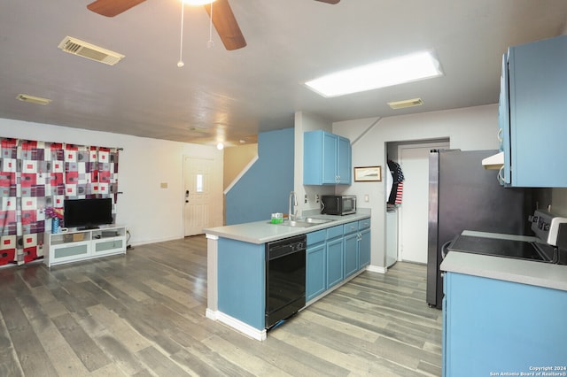 kitchen with ceiling fan, dishwasher, blue cabinets, light wood-type flooring, and sink