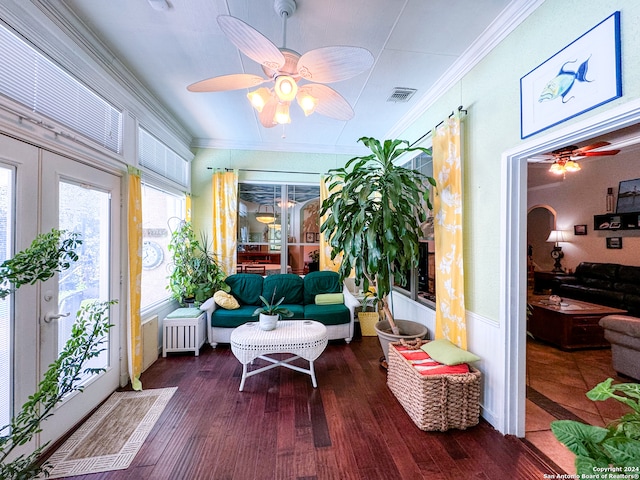 sunroom / solarium with ceiling fan