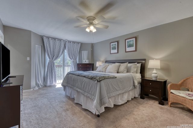 bedroom featuring ceiling fan, access to exterior, and light colored carpet