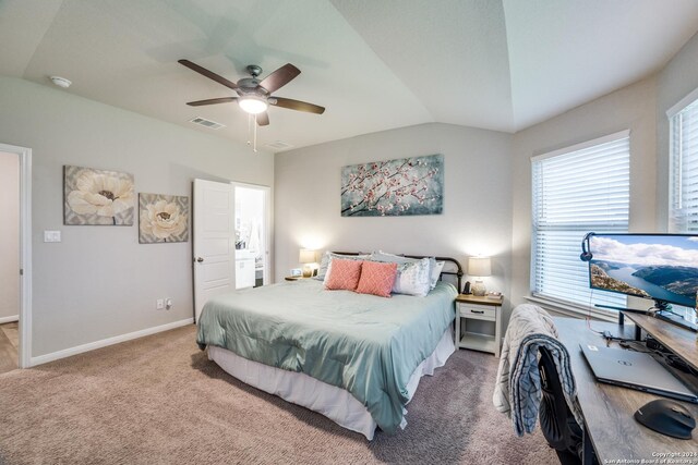 bedroom featuring vaulted ceiling, ceiling fan, and light colored carpet