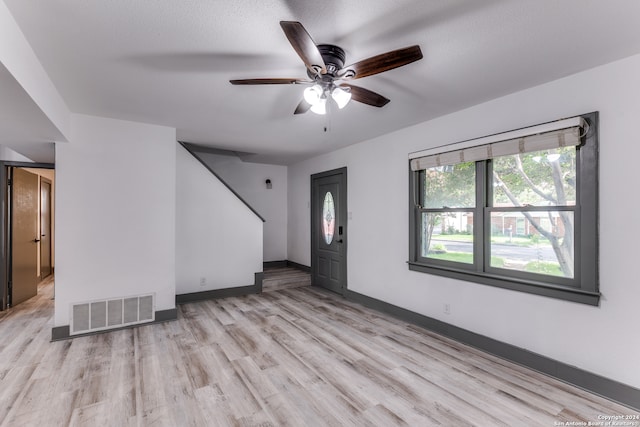 interior space featuring ceiling fan and light hardwood / wood-style flooring