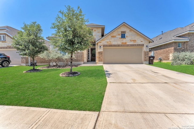 view of front of property with a garage and a front yard