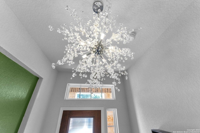 interior details with a chandelier