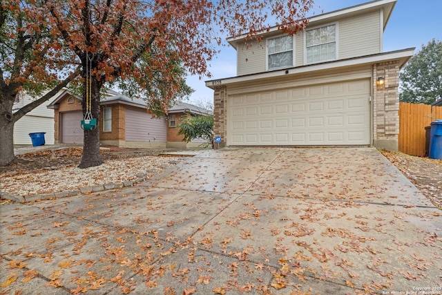 front of property with a garage