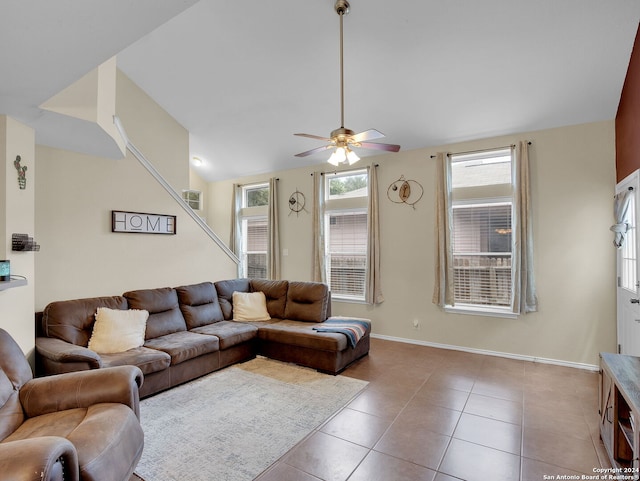 living room featuring ceiling fan and light tile patterned floors