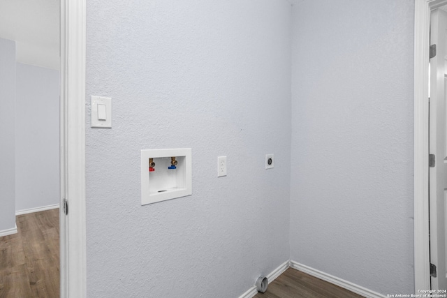 laundry area featuring hardwood / wood-style floors, hookup for a washing machine, and hookup for an electric dryer