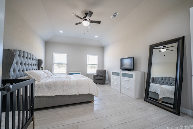 bedroom featuring ceiling fan and lofted ceiling