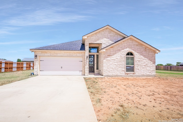 view of front of house with a garage