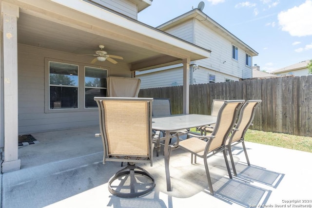 3802 Blue Oak Pass, San Antonio, TX 78223 - view of patio with fence, a ceiling fan, and outdoor dining space