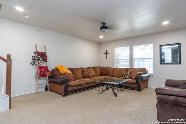 living room with carpet and ceiling fan