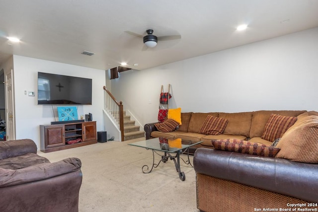 3802 Blue Oak Pass, San Antonio, TX 78223 - living room with stairs, ceiling fan, visible vents, and carpet floors
