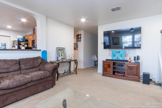 3802 Blue Oak Pass, San Antonio, TX 78223 - living room with visible vents, arched walkways, baseboards, carpet, and recessed lighting