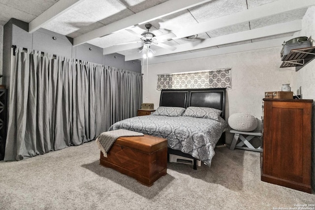 bedroom featuring visible vents, carpet flooring, ceiling fan, and beam ceiling