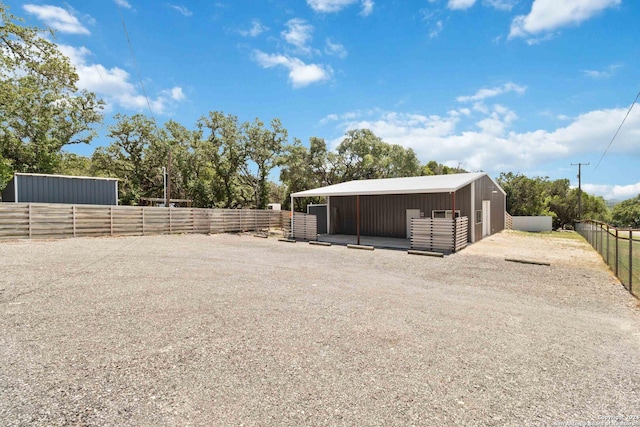 exterior space featuring an outdoor structure and an exterior structure